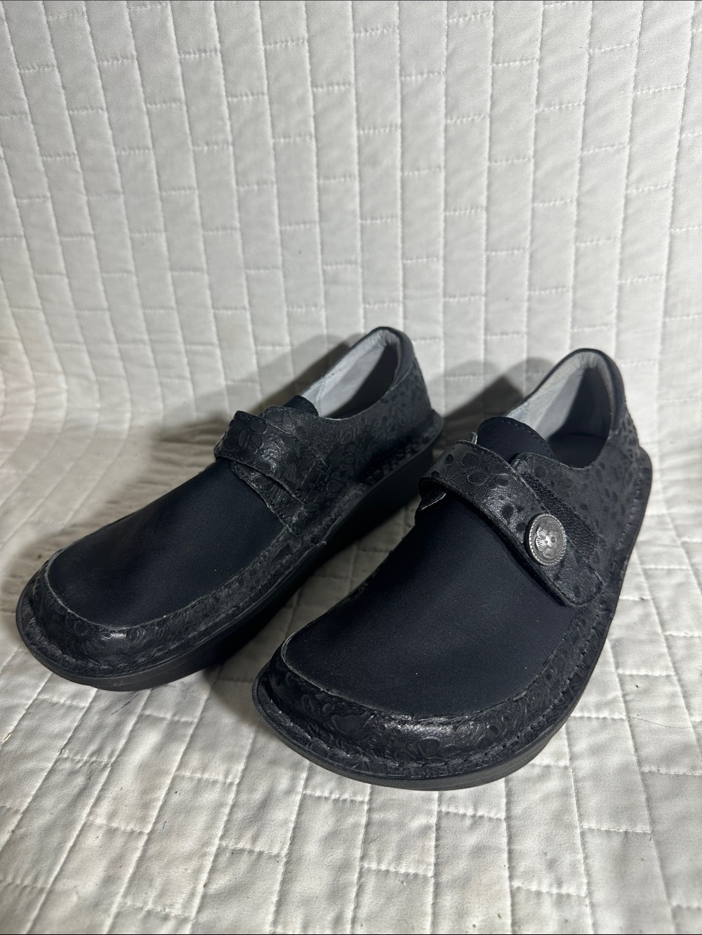 Alegria Dena slip-on shoes featuring a patterned texture & adjustable strap